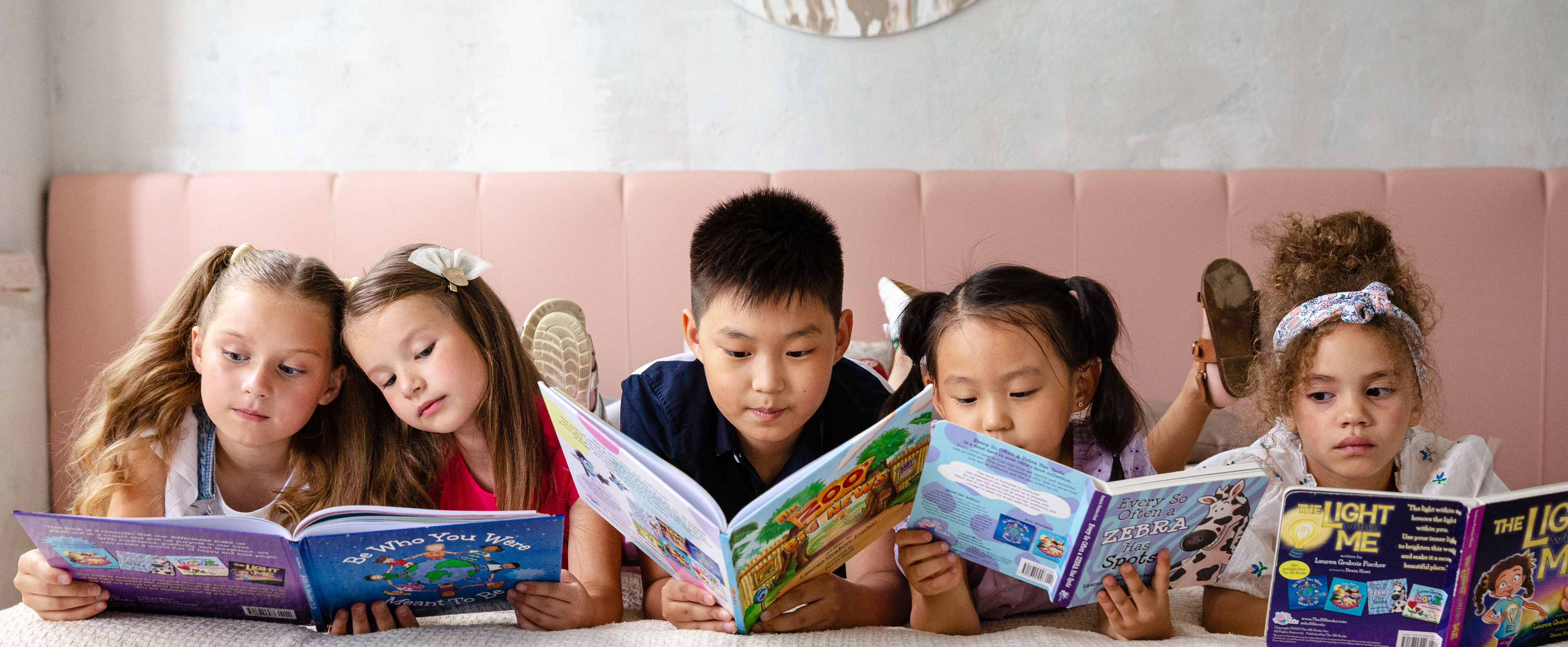 Children reading The Be Books series by Lauren Grabois Fischer, promoting kindness, confidence, and mindfulness.