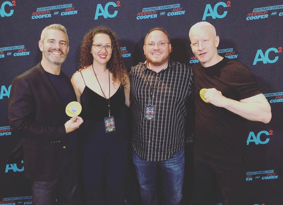 Lauren Grabois Fischer with Andy Cohen and Anderson Cooper at an AC² event, sharing her children's books that inspire kindness and love
