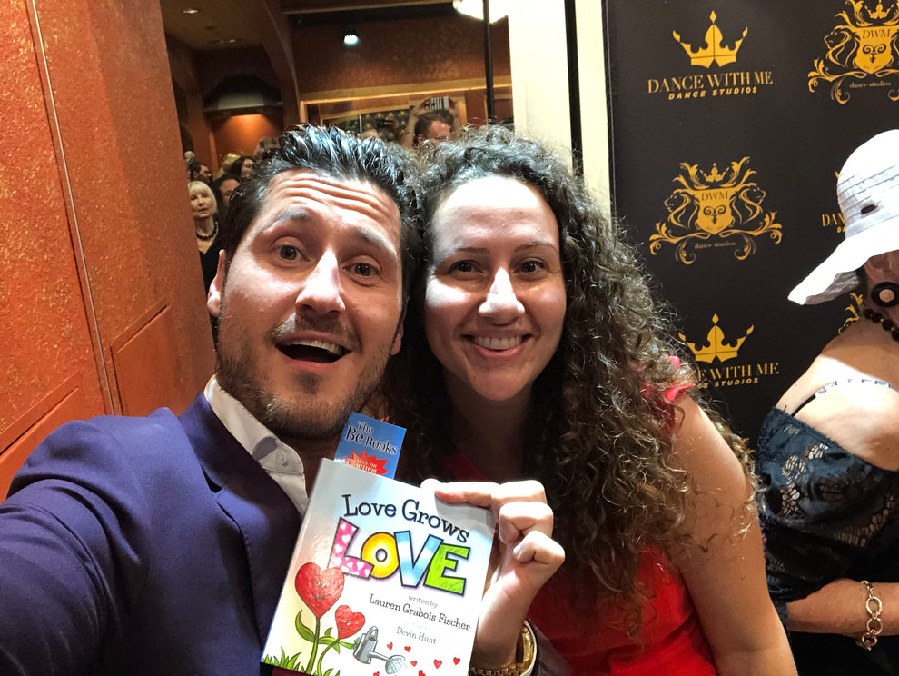 Lauren Grabois Fischer and Val Chmerkovskiy share excitement for her book 'Love Grows Love' at a 'Dance With Me' event, promoting kindness