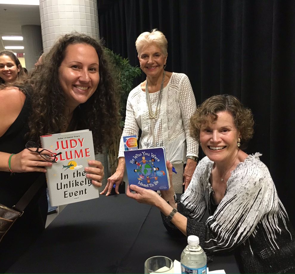 Lauren Grabois Fischer sharing 'Be Who You Were Meant to Be' with Judy Blume, celebrating impactful children's literature.