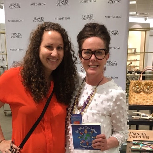 Lauren Grabois Fischer with Rob Schneider celebrating her children's book 'Every So Often a Zebra Has Spots' at a special event.